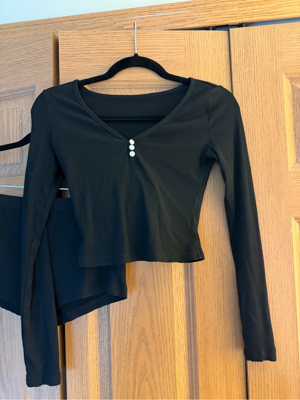 Black Long-Sleeve V-Neck Crop Top with Button Detail